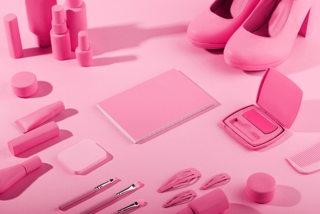 Free photo pink model career kit arrangement