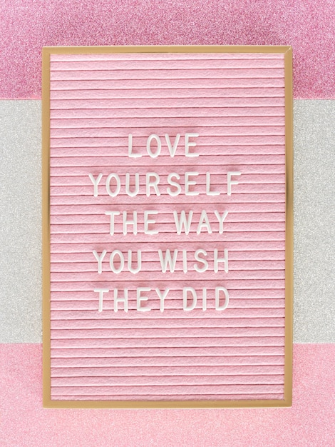 Free photo pink motivational text board top view