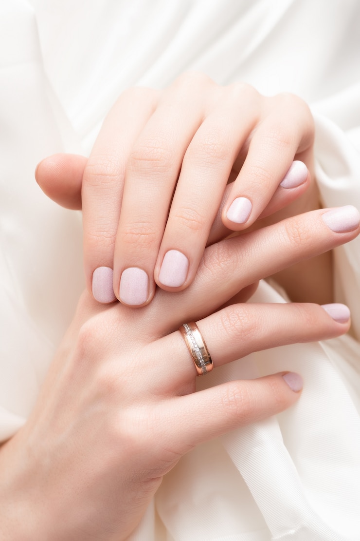 Free Photo pink nail design. female hands with glitter manicure.