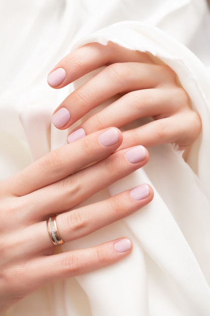 Free Photo pink nail design. female hands with glitter manicure.