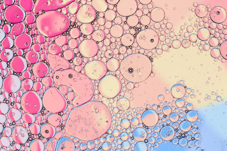 無料Photo ピンクの油性インクの泡と滴