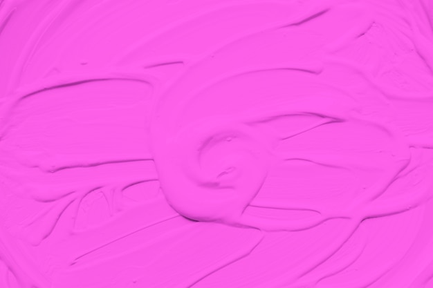 Free photo pink paint scattered smoothly