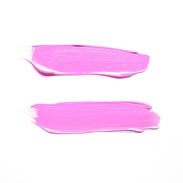 Free photo pink paint smears on white