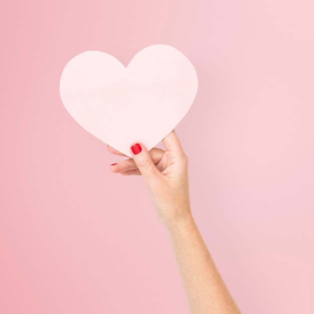 Free photo pink paper heart for valentines celebration