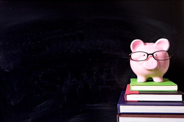 Free photo pink piggybank in class