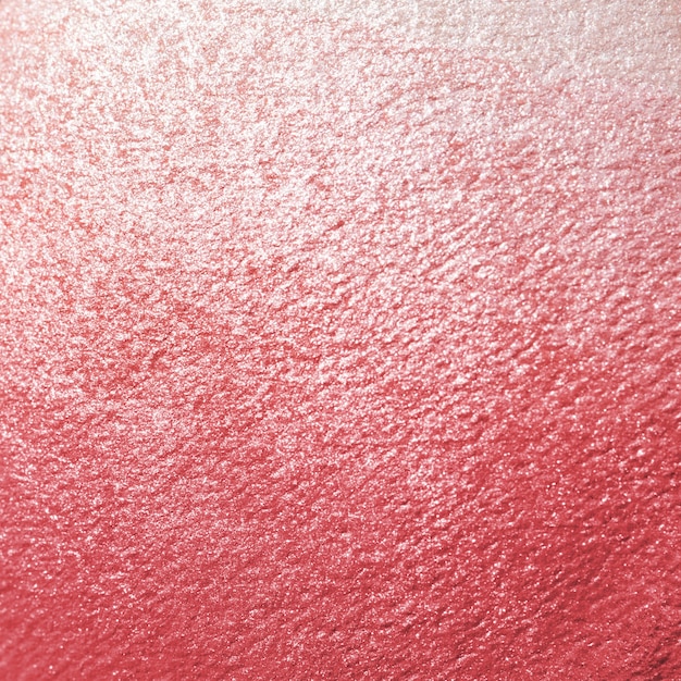 Pink shiny textured paper background