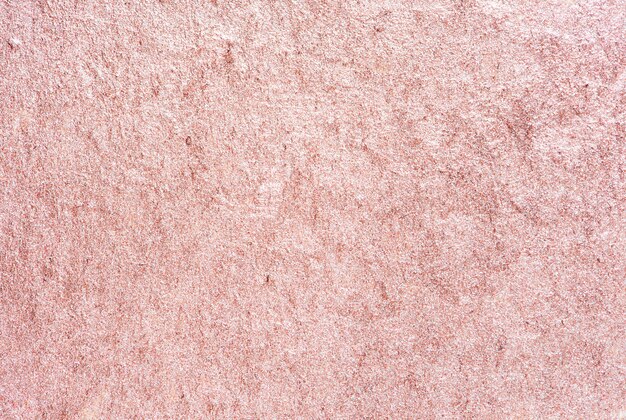 Pink shiny textured paper background