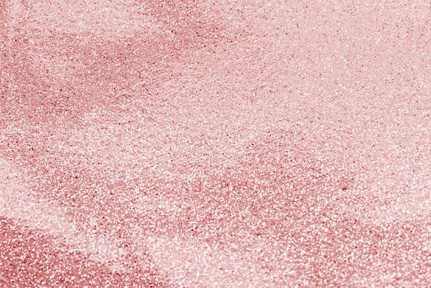 Free photo pink shiny textured paper background