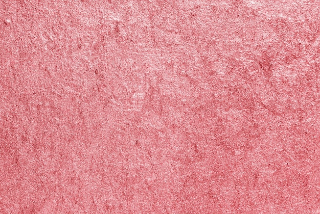 Pink shiny textured paper background