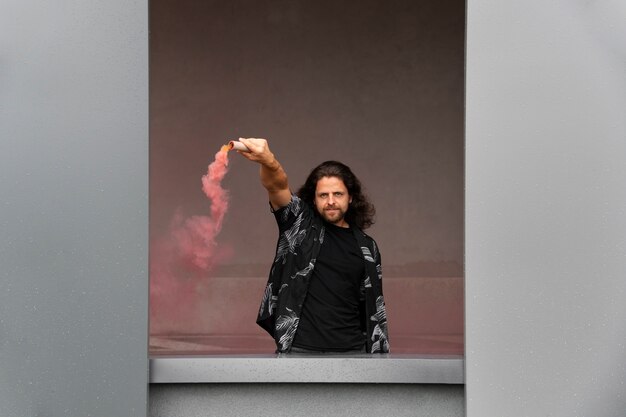 Pink smoke background with young adult