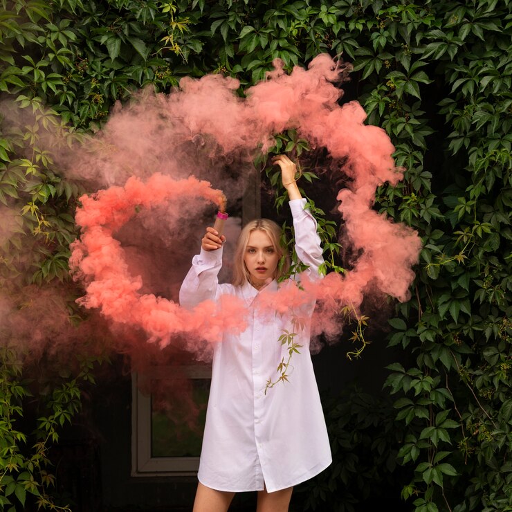 Free Photo pink smoke background with young adult