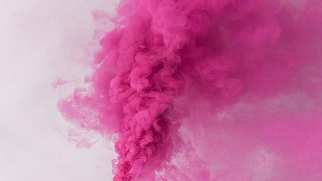 Pink smoke effect on a white wallpaper