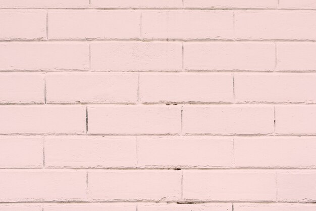 Pink textured brick wall
