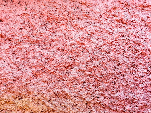 Free photo pink textured wall