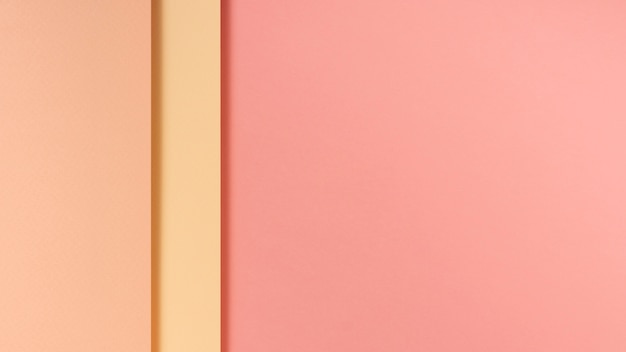 Free photo pink toned paper sheets with copy space