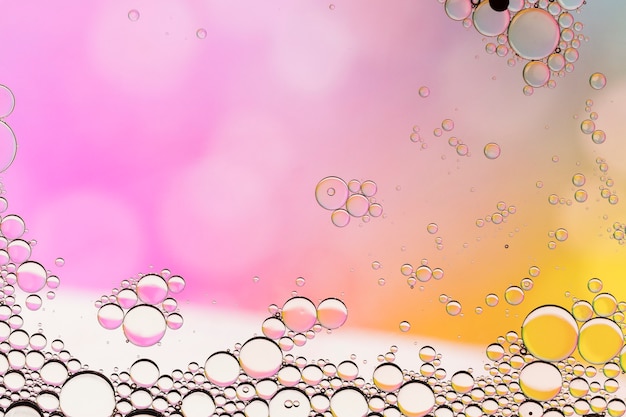 Free photo pink and transparent bubbles abstract