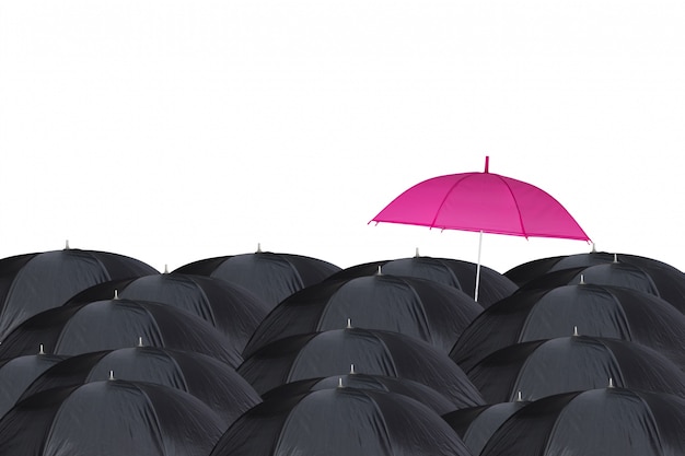 Pink umbrella among black umbrellas