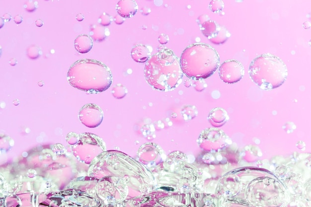 Pink underwater bubbles abstract in oil