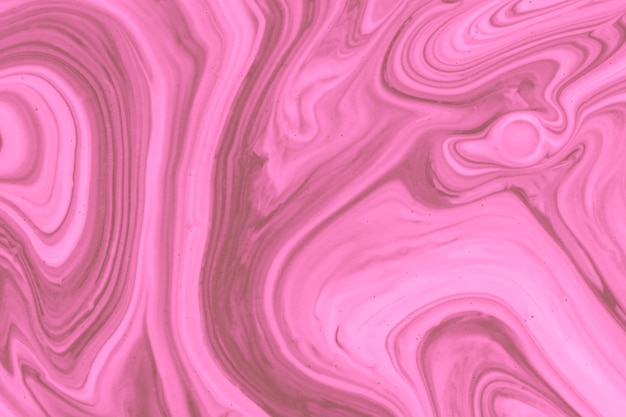 Pink waves of fluid acrylic pour painting