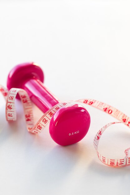 Pink weights and a tape measure