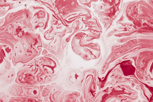 Pink and white mixed paint splash