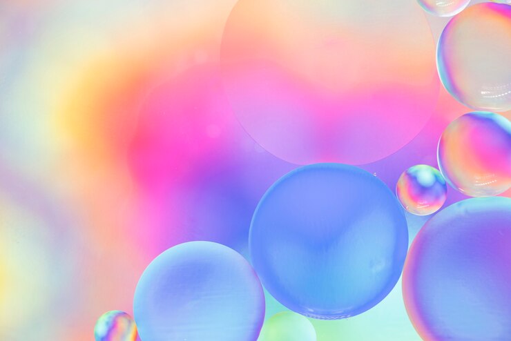 Free Photo pink yellow and blue abstract background with bubbles