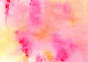 Free photo pink and yellow watercolor background