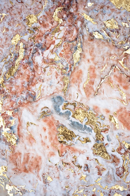 Pinkish and gold marble textured