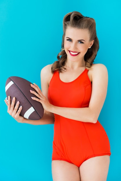 Pinup woman in red swimsuit