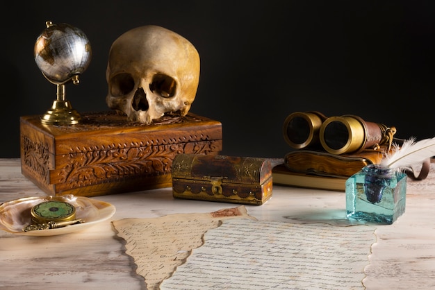 Free photo pirate artifacts arrangement still life