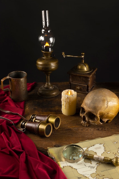 Free photo pirate artifacts arrangement still life