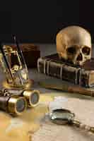 Free photo pirate artifacts arrangement still life