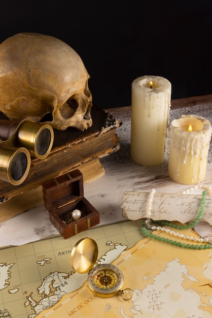 Free photo pirate artifacts arrangement still life