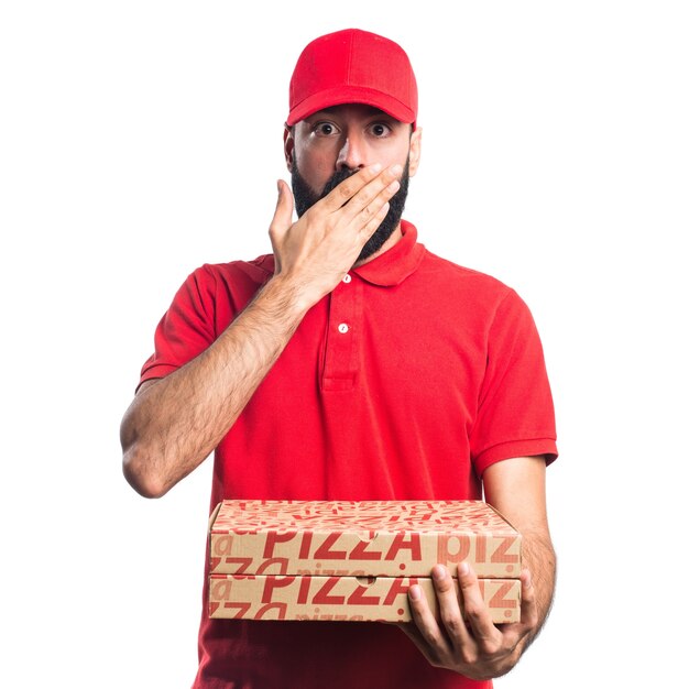 Pizza delivery man doing surprise gesture