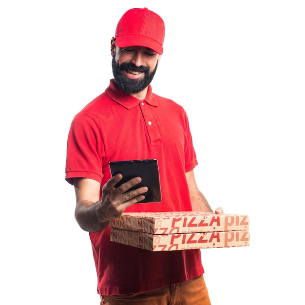 Pizza delivery man holding a tablet