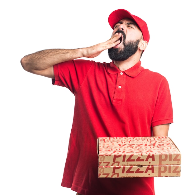 Pizza delivery man yawning