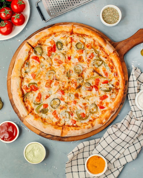 Pizza pepperoni on wooden board