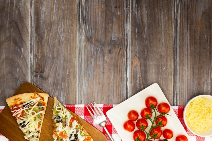 Free Photo pizza slices with tomatoes