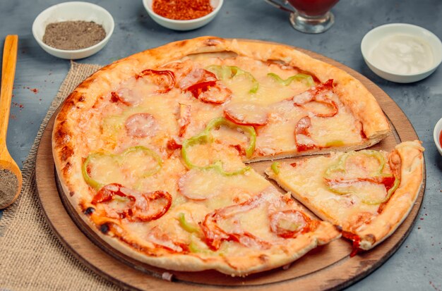 pizza with bell pepper on the table