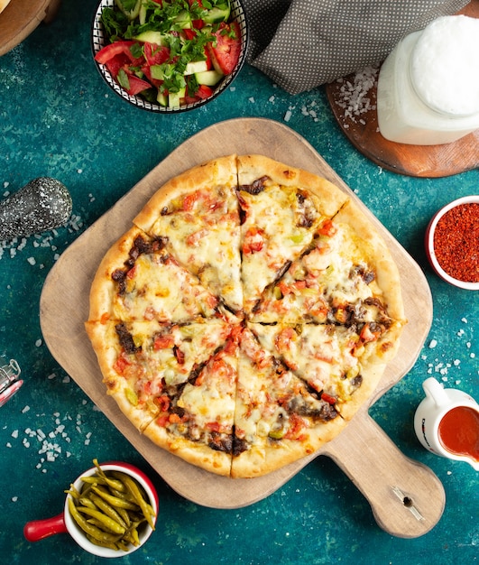 Pizza with mushrooms vegetables and cheese