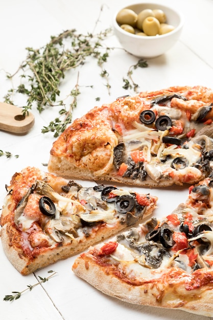 Pizza with olives and vegetables