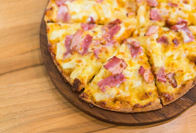 Pizza on wooden background