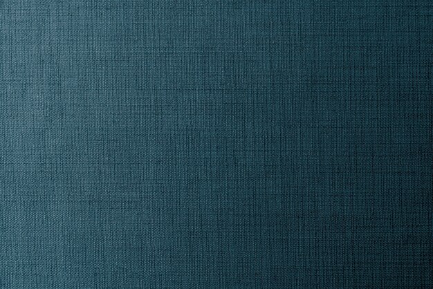 Plain dark blue fabric textured background