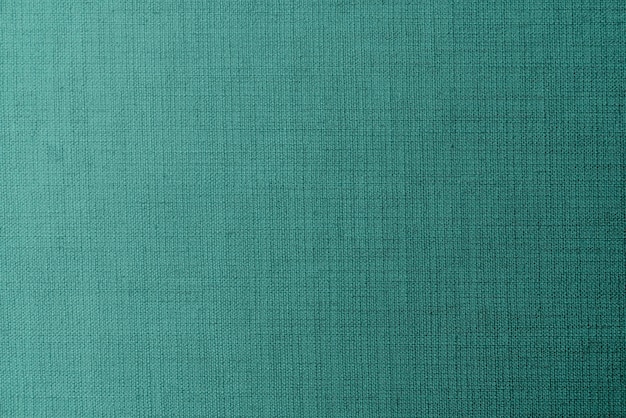 Plain green fabric textured background