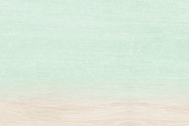 Free photo plain pastel green with beige wooden product background