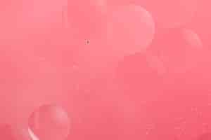 Free photo plain pink bubbles background