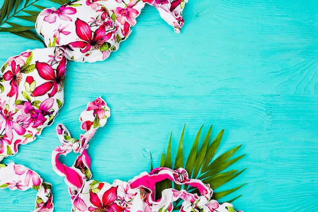 Plant foliage and swimsuit on board