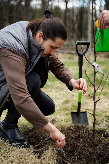 Planting trees as part of reforestation process