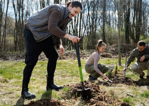 Planting trees as part of reforestation process