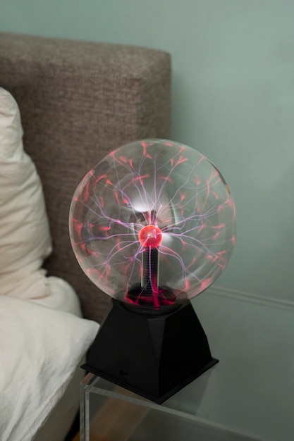 Plasma ball on a nightstand in the bedroom